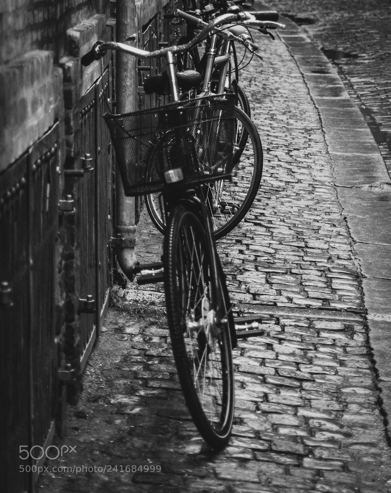 Nikon D3100 sample photo. Cobblestone and wheels photography