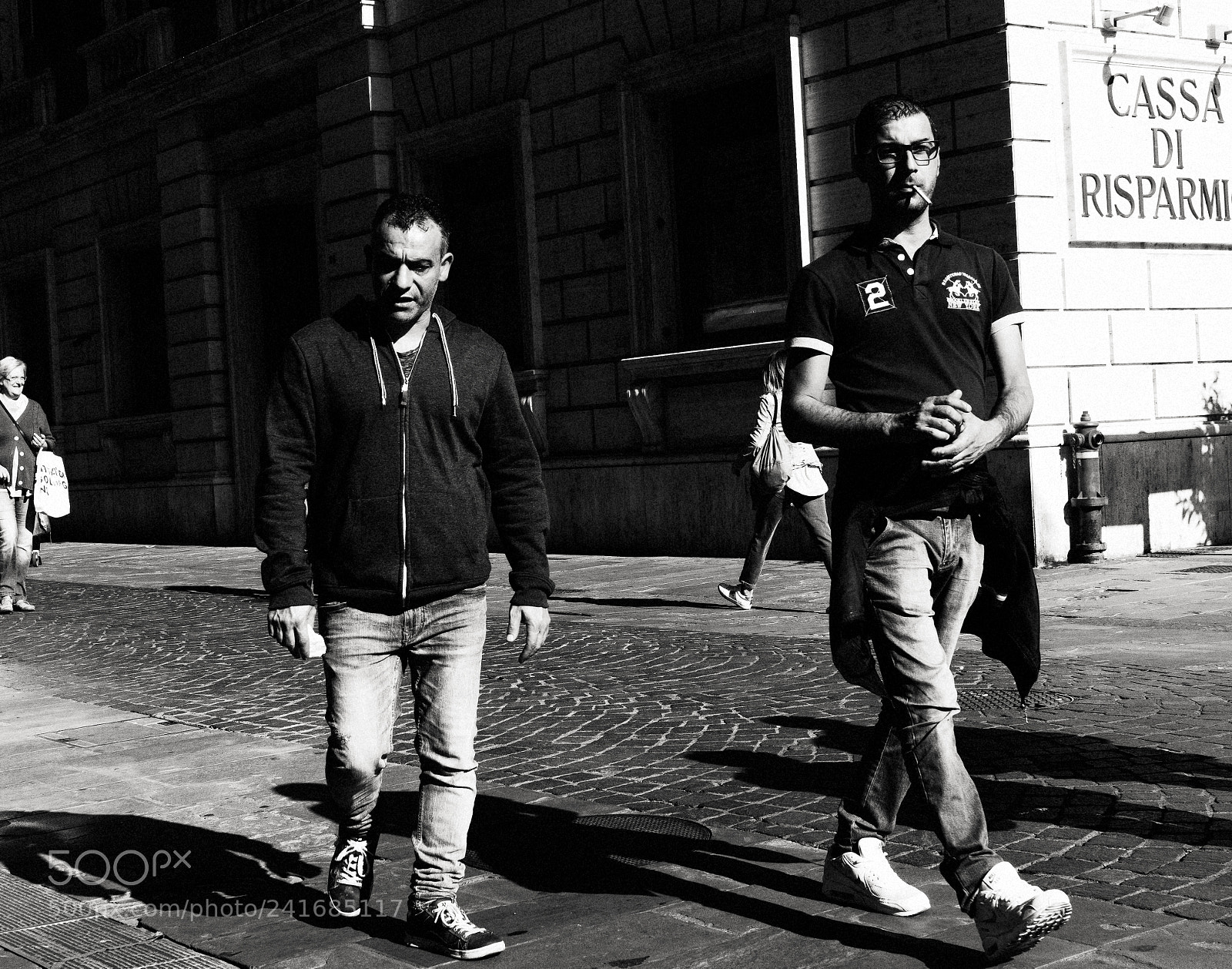 Sony a6500 sample photo. Men walking in shadow photography