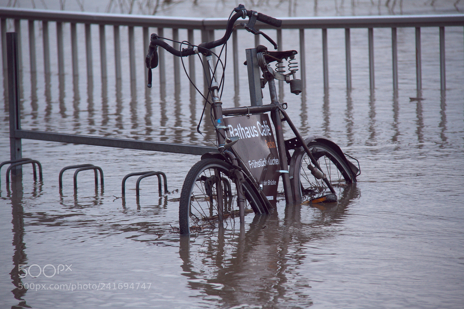 Canon EF-S 18-200mm F3.5-5.6 IS sample photo. Flood bike photography