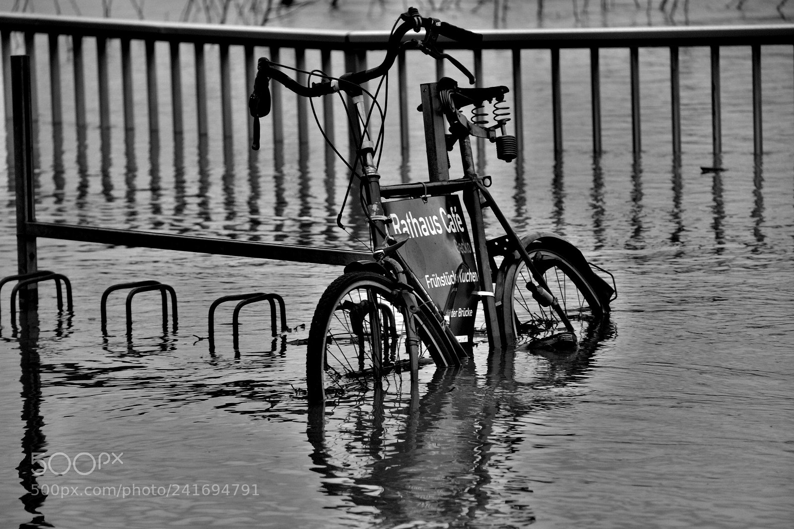 Canon EF-S 18-200mm F3.5-5.6 IS sample photo. Flood bike b&w photography