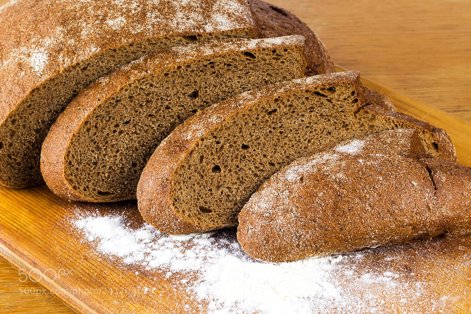Canon EOS 1200D (EOS Rebel T5 / EOS Kiss X70 / EOS Hi) sample photo. Chopped rye bread board photography
