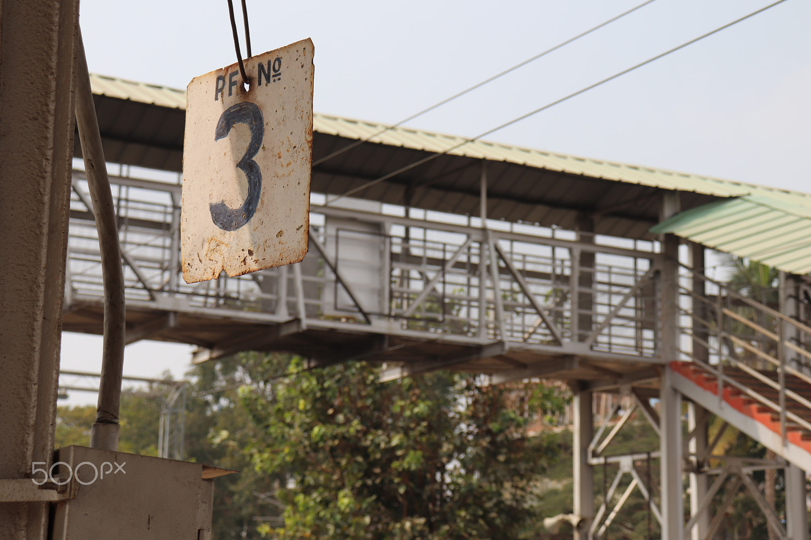 Canon EF-S 18-55mm F4-5.6 IS STM sample photo. Rusty sign on indian railway platform photography