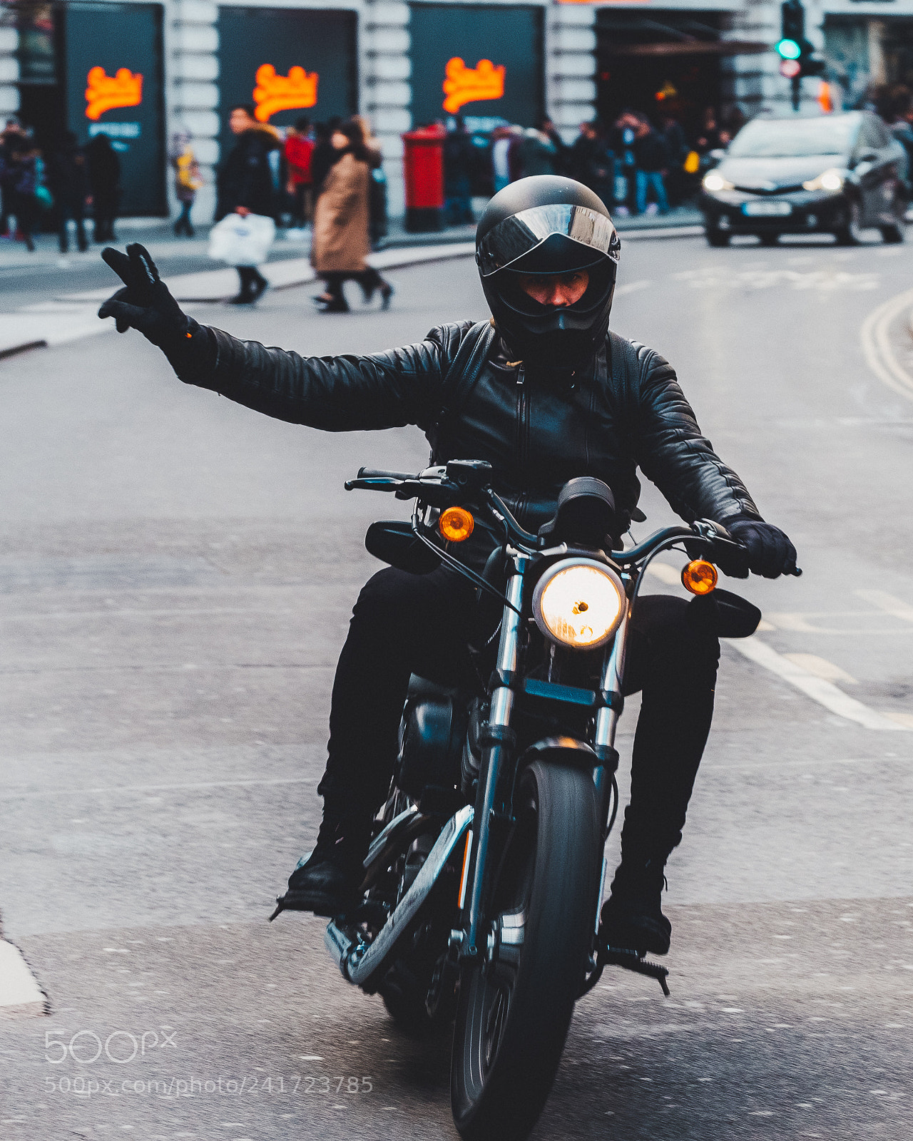 Fujifilm X-T2 sample photo. Saluting motorcyclist photography