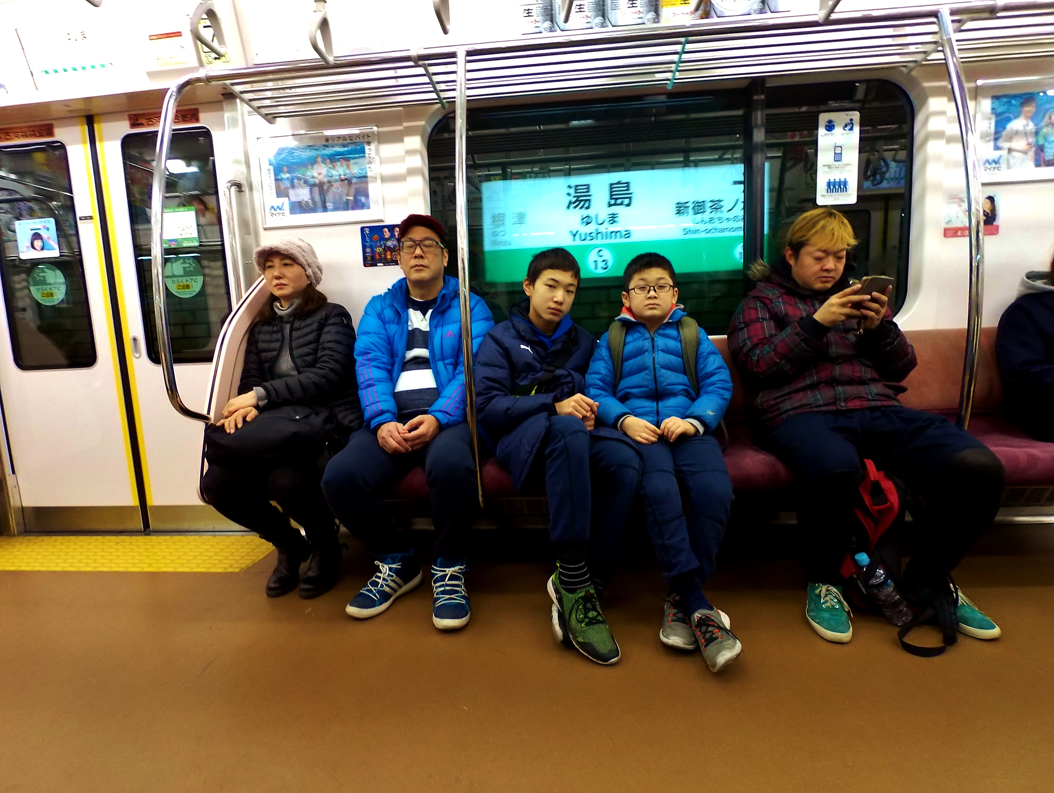 HTC RE sample photo. Subway family photography