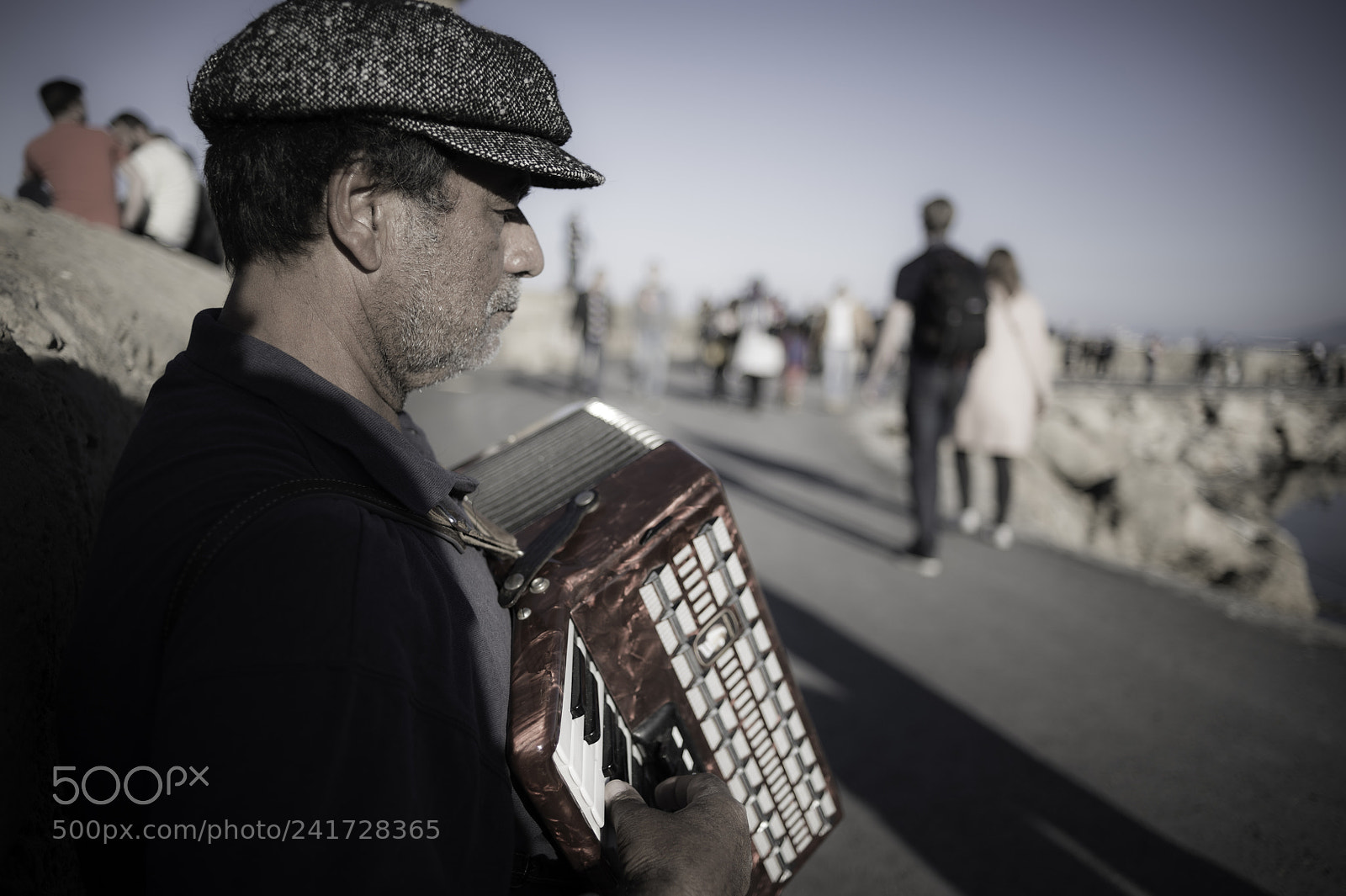 Nikon D4 sample photo. A lonely street performer photography