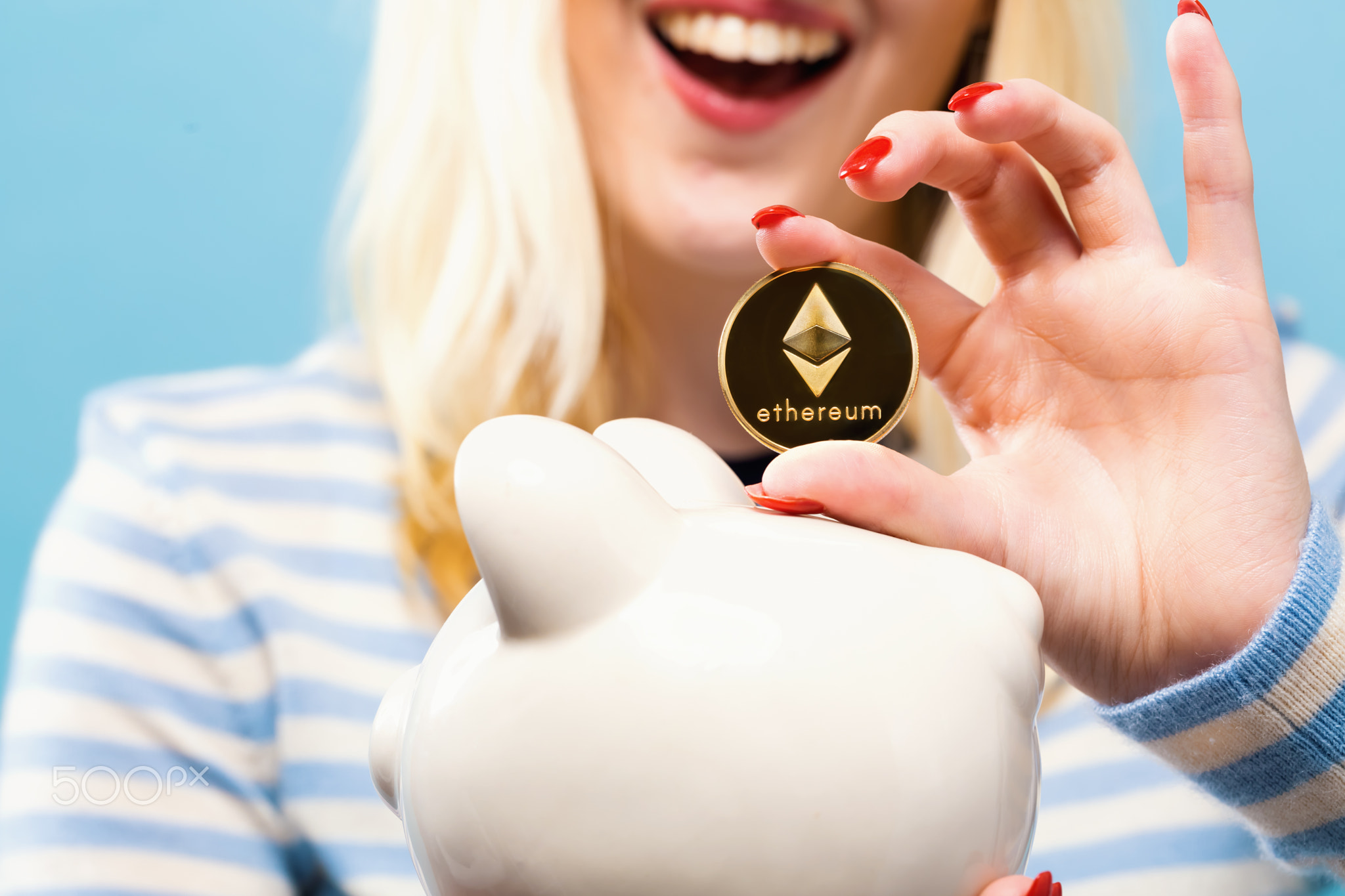 Woman with ethereum coin and piggy bank