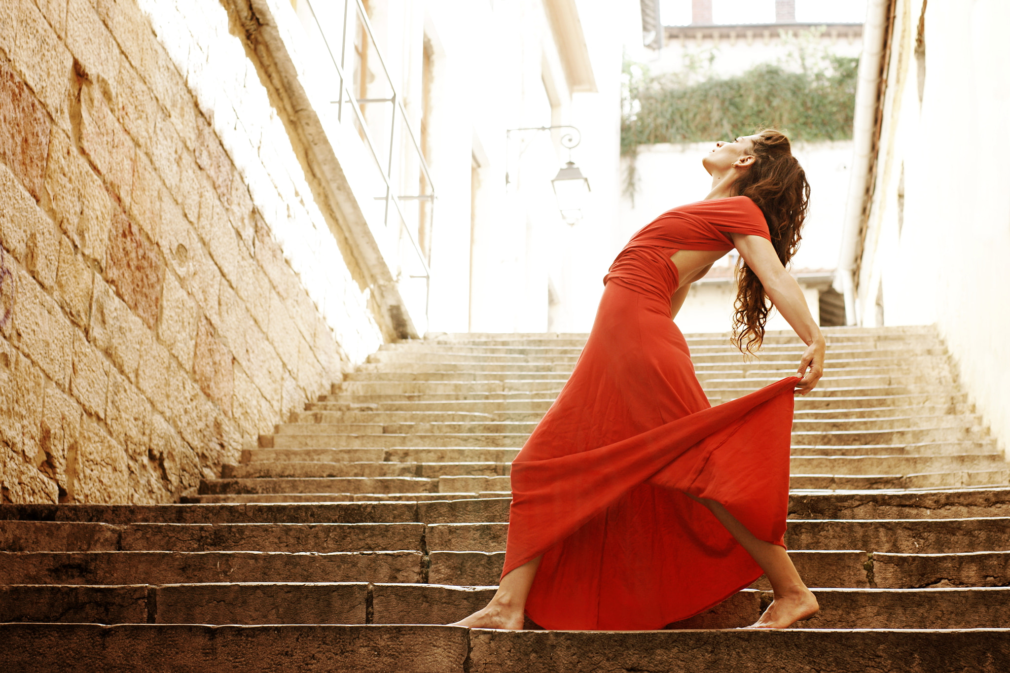 Sony Alpha DSLR-A700 + Sony 50mm F1.4 sample photo. Red dress in the stairway photography