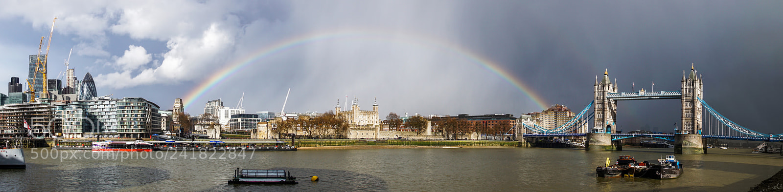 Sony ILCA-77M2 sample photo. Rainbow over the tower photography