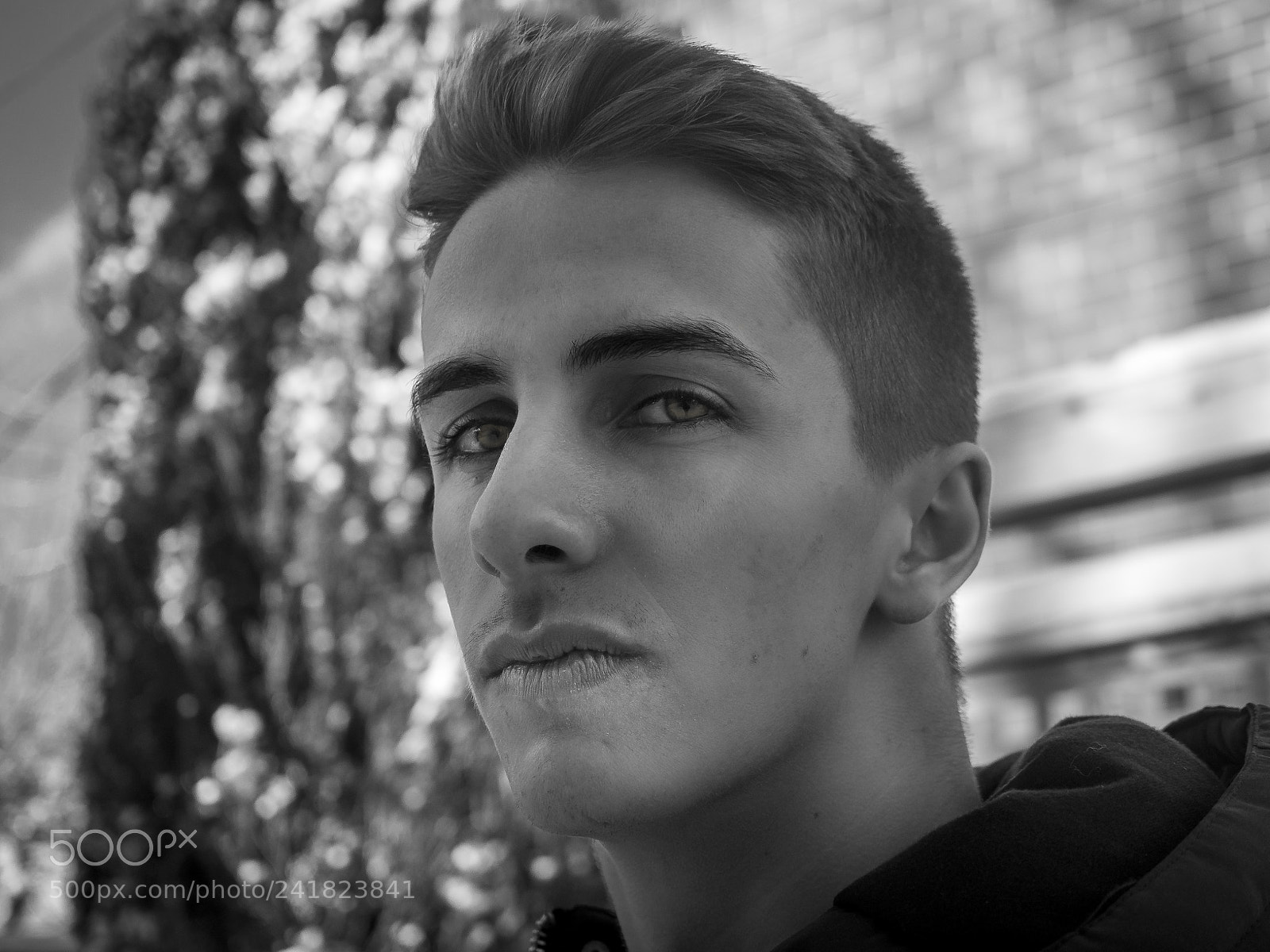 Olympus OM-D E-M1 sample photo. Young man wearing a photography