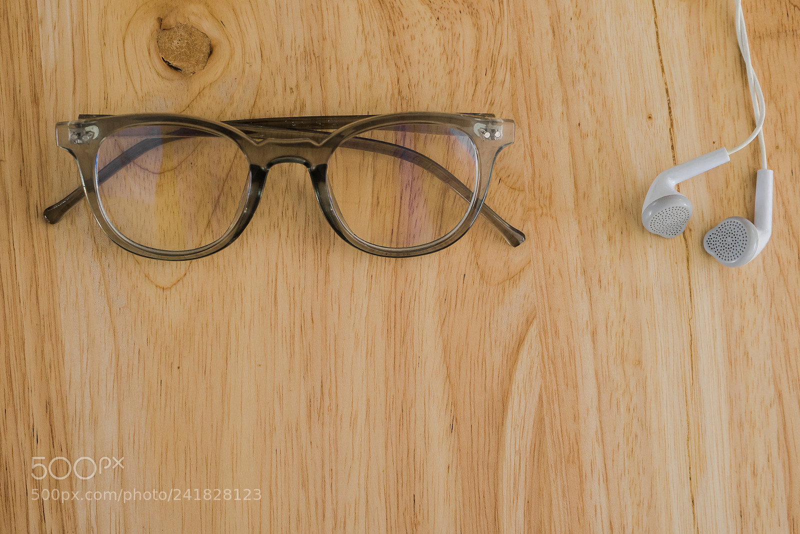 Sony a7 sample photo. Glasses and earphone on photography