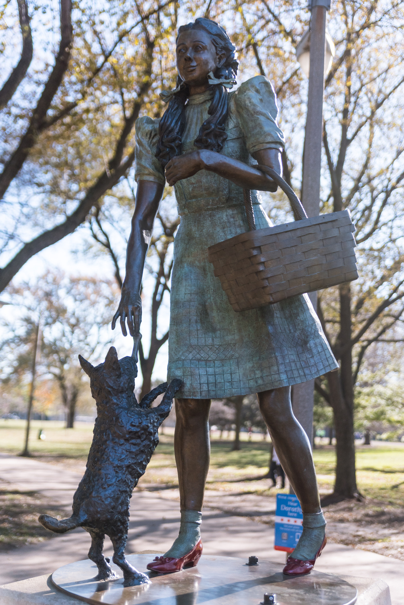 Dorothy and Toto bronze statue in the park