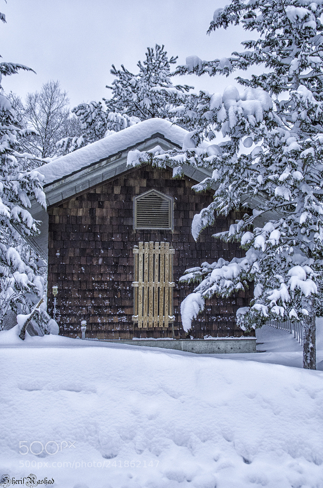 Pentax K-50 sample photo. Snow covered countryside house photography