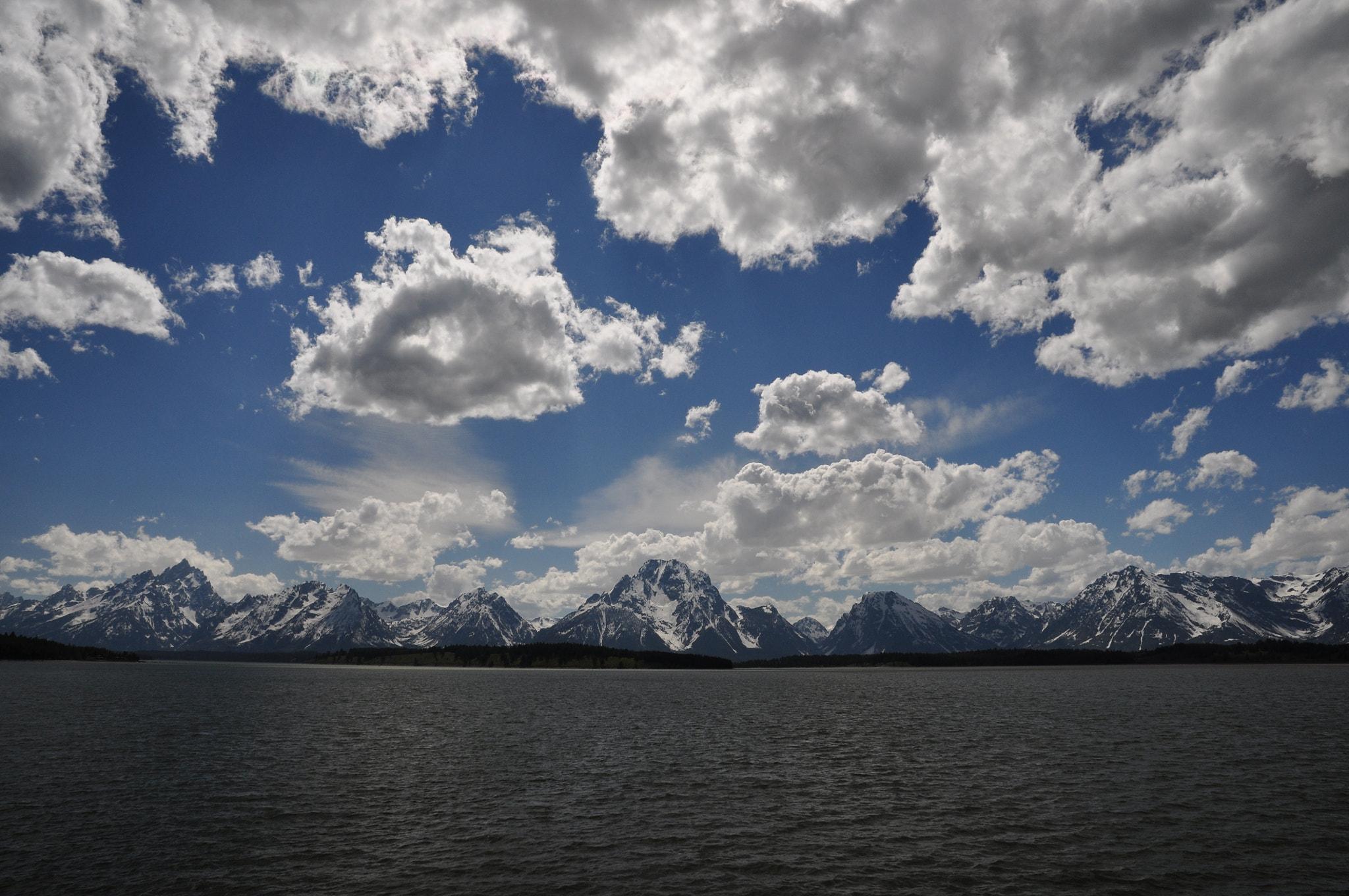 Nikon D90 + Nikon AF-S DX Nikkor 16-85mm F3.5-5.6G ED VR sample photo. Clouds fixed in a steely blue sky in the grand tetons national park photography