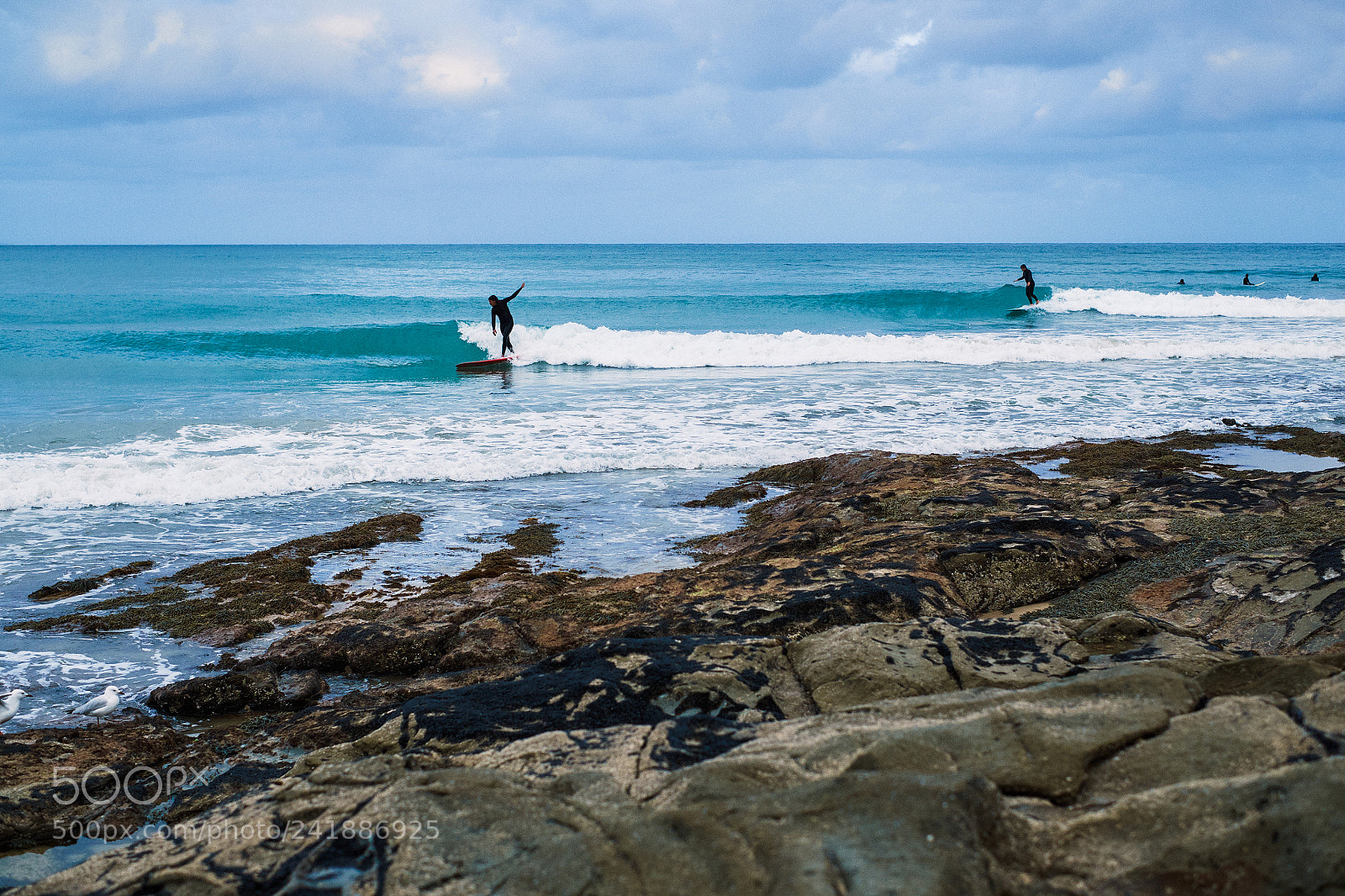Fujifilm X-E2 sample photo. Surfers catching waves photography