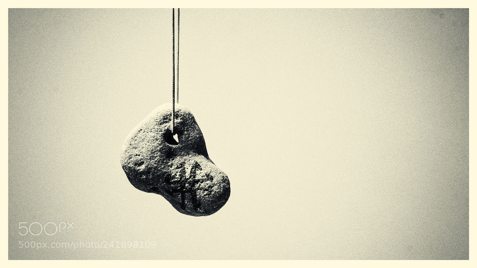 Pentax K200D sample photo. Adder stone amulet photography
