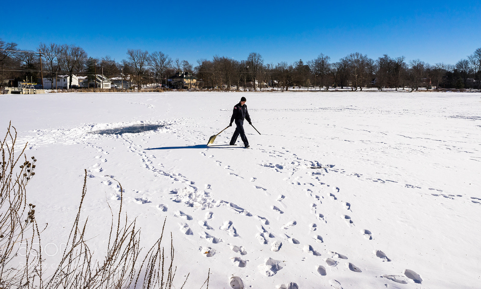 Sony a7 II sample photo. Walking on frozen lake photography