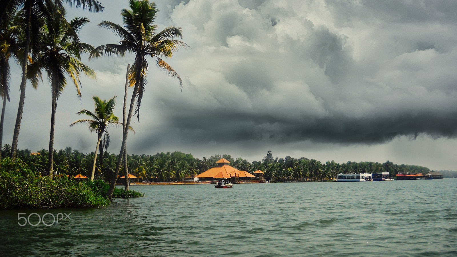 Nikon Coolpix L20 sample photo. Scenic view of back water against cloudy sky photography