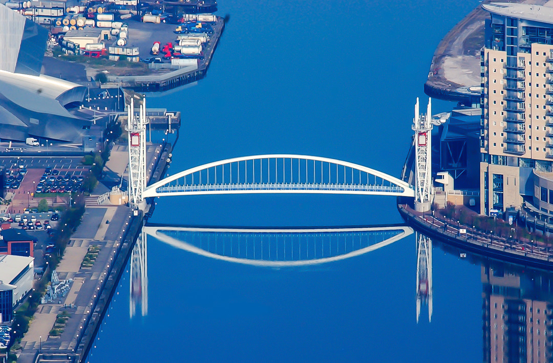 Nikon D1H sample photo. Reflections on the manchester ship canal. taken in 2003 as i passed the lowry centre in salford. photography