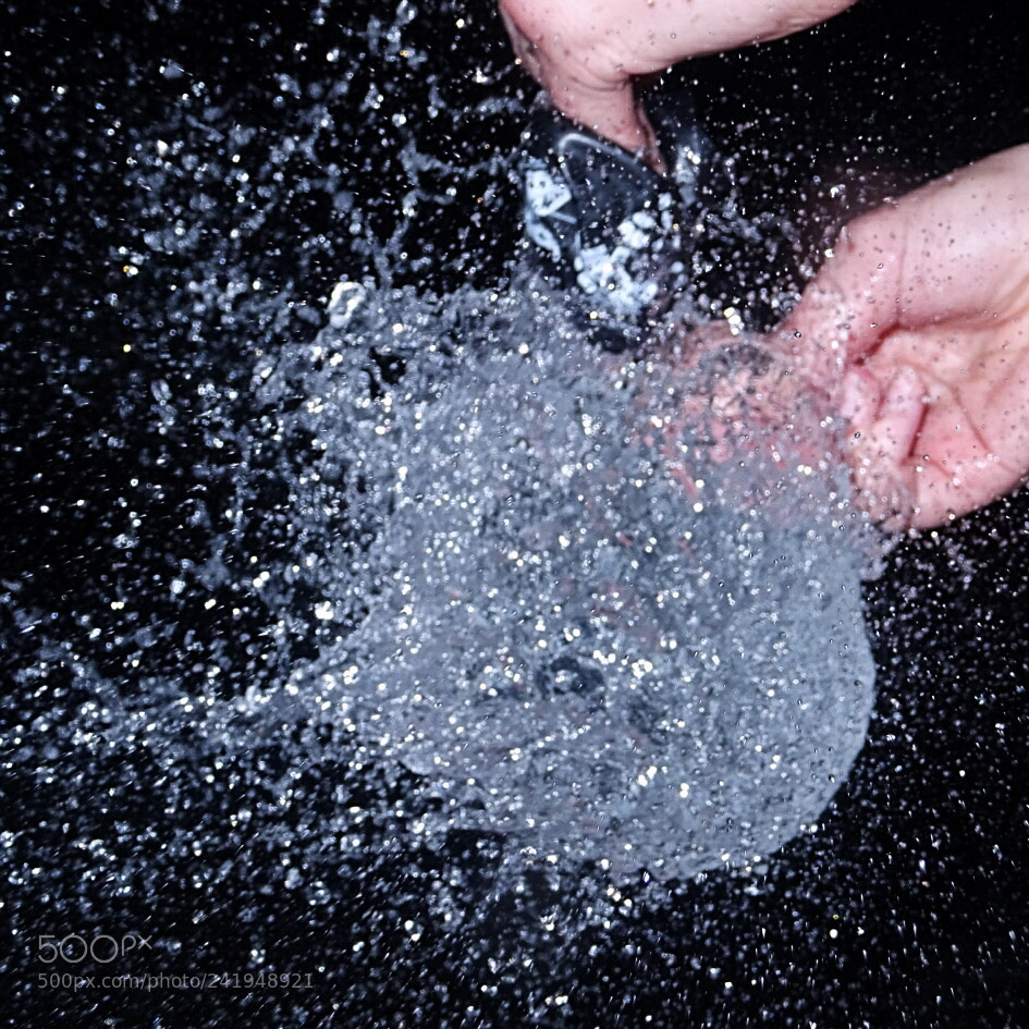 Sony DSC-HX60 sample photo. Playing with water balloons photography