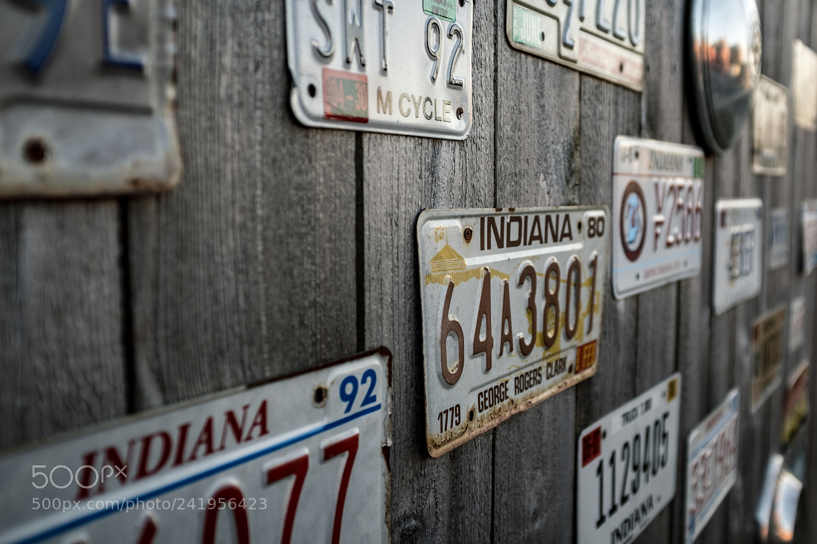 Fujifilm X100F sample photo. License plate fence photography