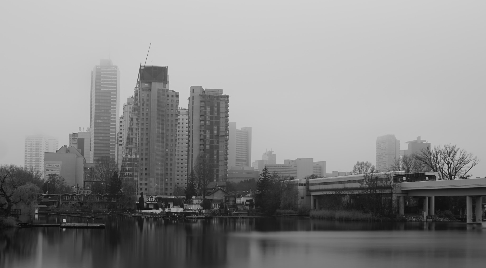 Sony a6000 + Sigma 19mm F2.8 EX DN sample photo. Foggy day in kaisermühlen, vienna photography