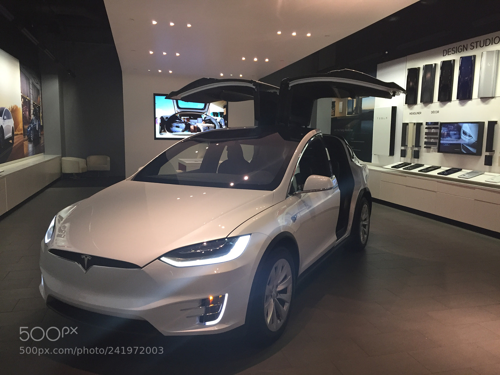 Apple iPhone 6 sample photo. Tesla suv with built-in photography