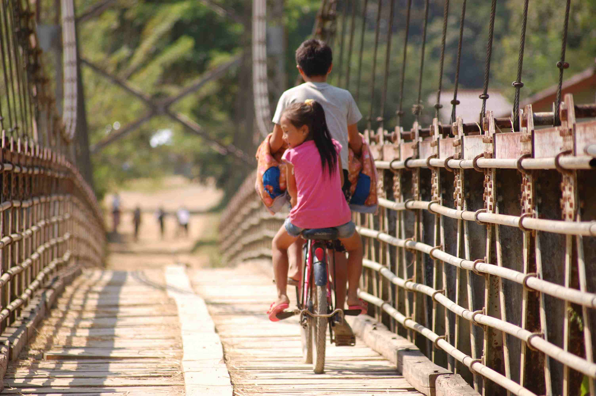 Nikon D40 + Sigma 70-300mm F4-5.6 APO DG Macro sample photo. Bike on bridge photography