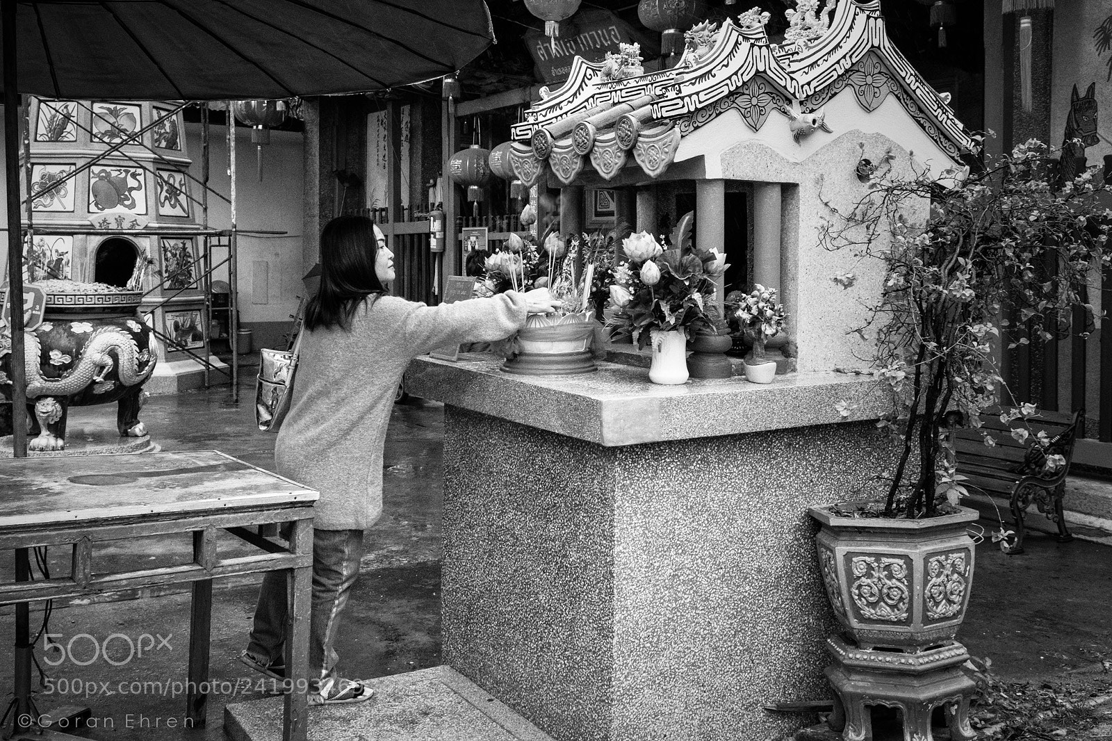 Fujifilm X-T2 sample photo. Lighting the incense sticks photography