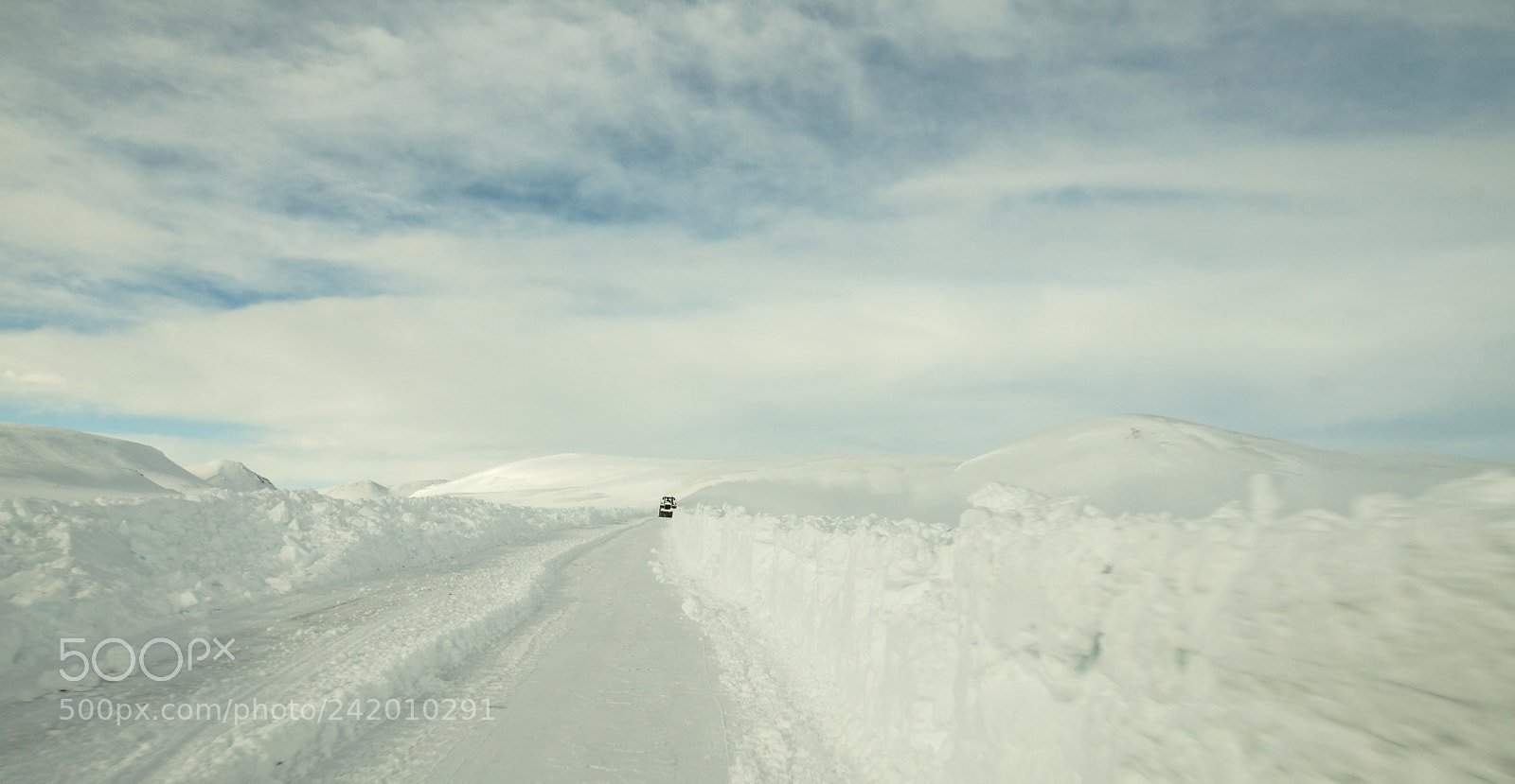 Sony SLT-A57 sample photo. A snowy road in photography