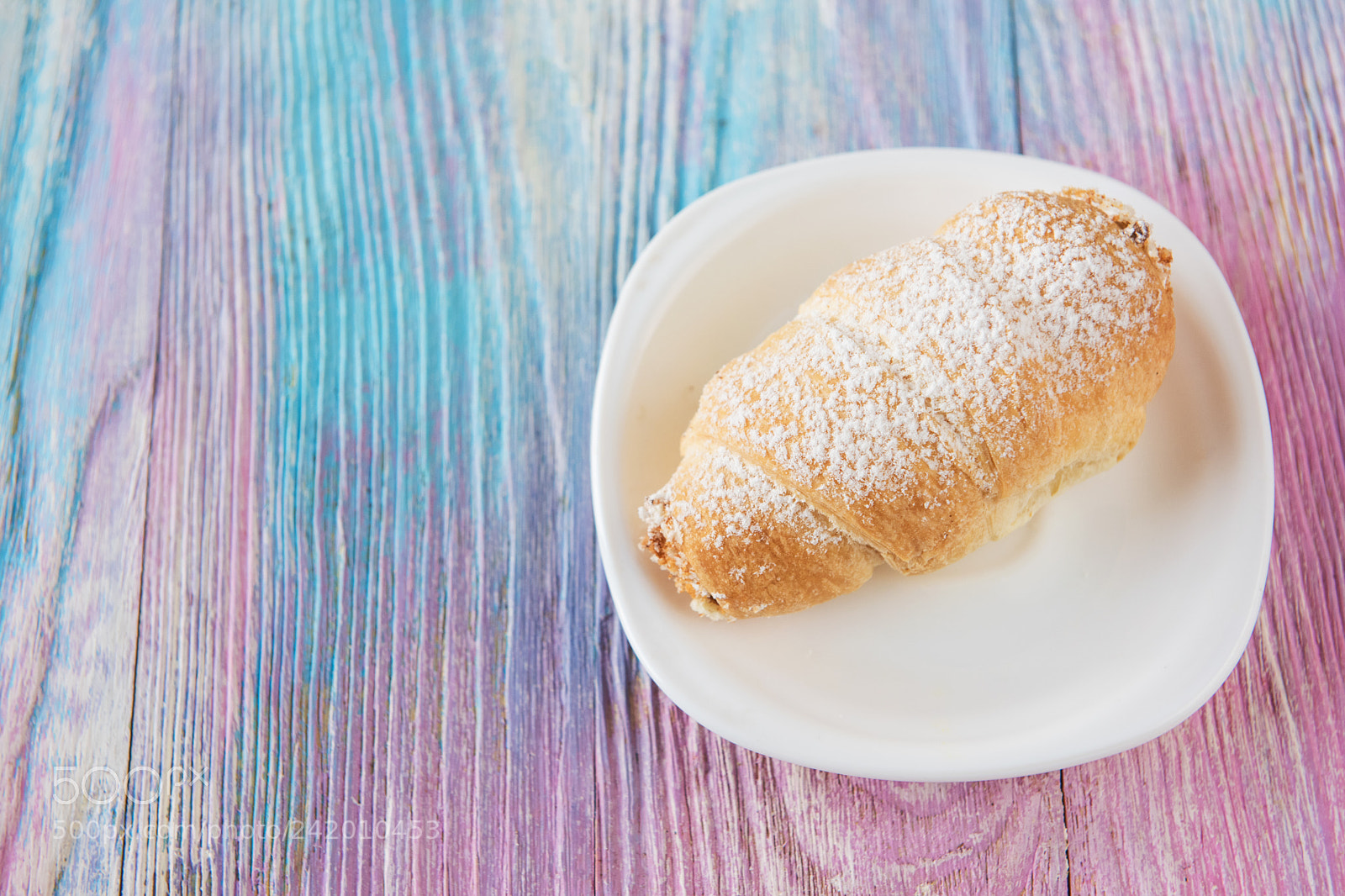Nikon D810 sample photo. Tasty eclair on plate photography