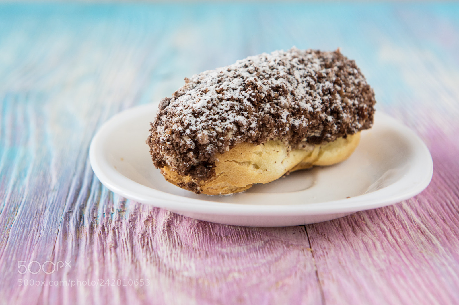 Nikon D810 sample photo. Tasty eclair on plate photography