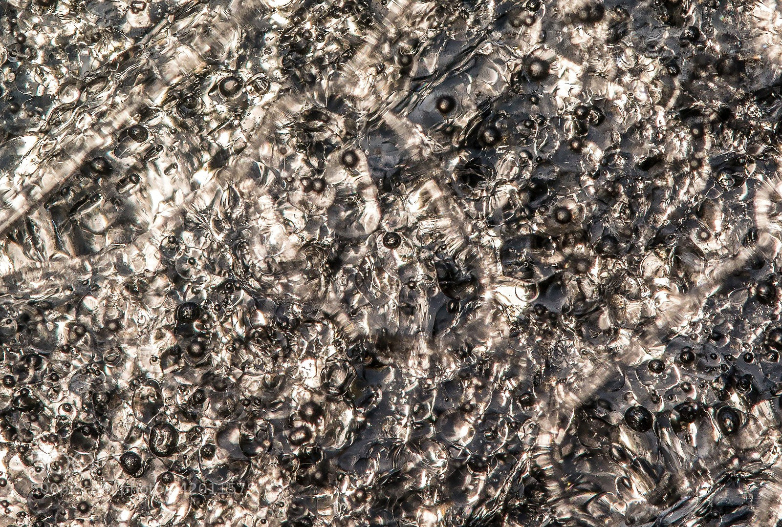 Panasonic Lumix DMC-GX1 sample photo. Bubbles within ice photography