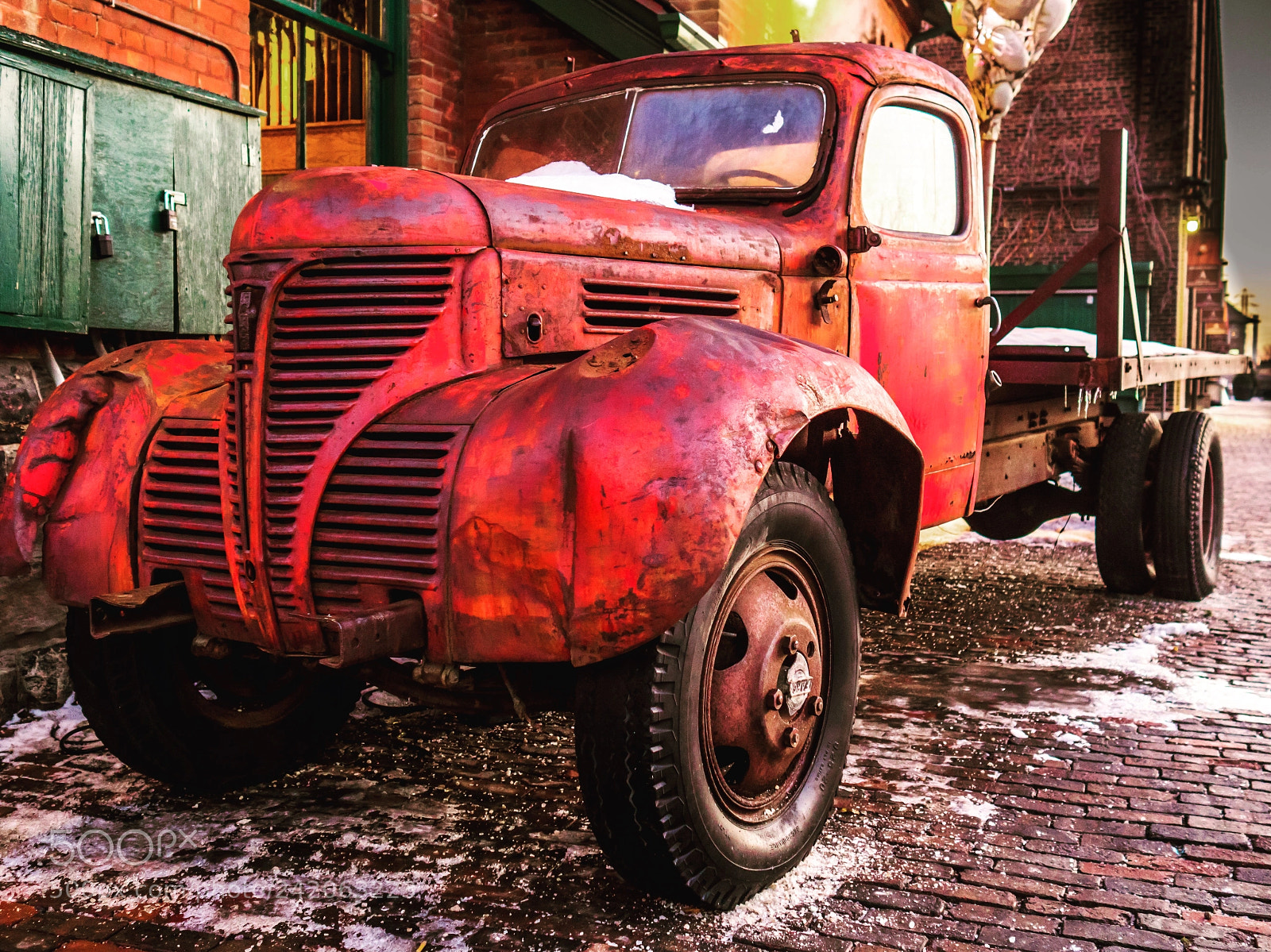 Olympus PEN-F sample photo. Vintage red truck, distillery photography