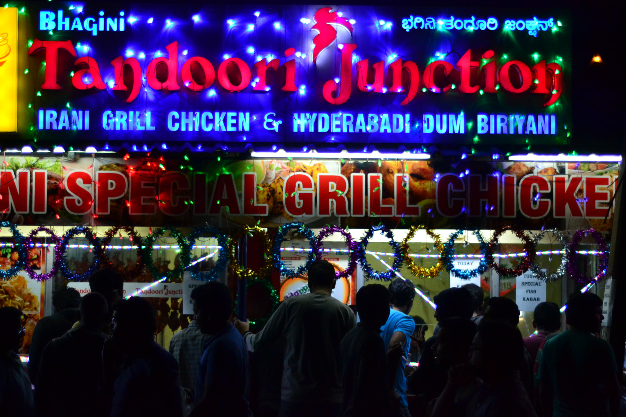 Nikon D3100 + Nikon AF Nikkor 50mm F1.8D sample photo. People flocking at tandoori junction photography