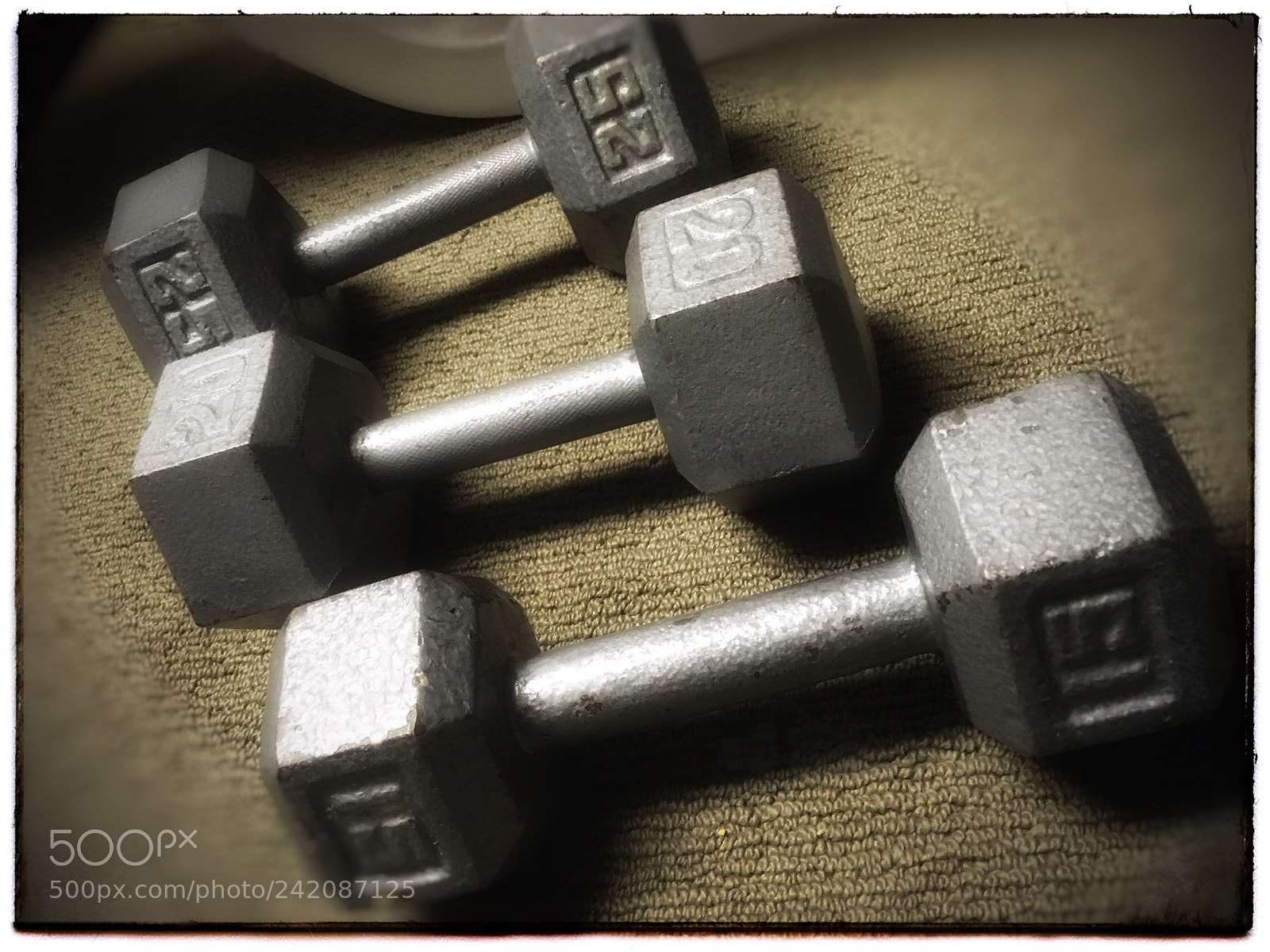 Apple iPhone SE sample photo. Free weights at rest. photography