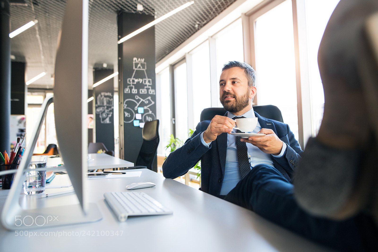Nikon D5 sample photo. Businessman drinking coffee with photography