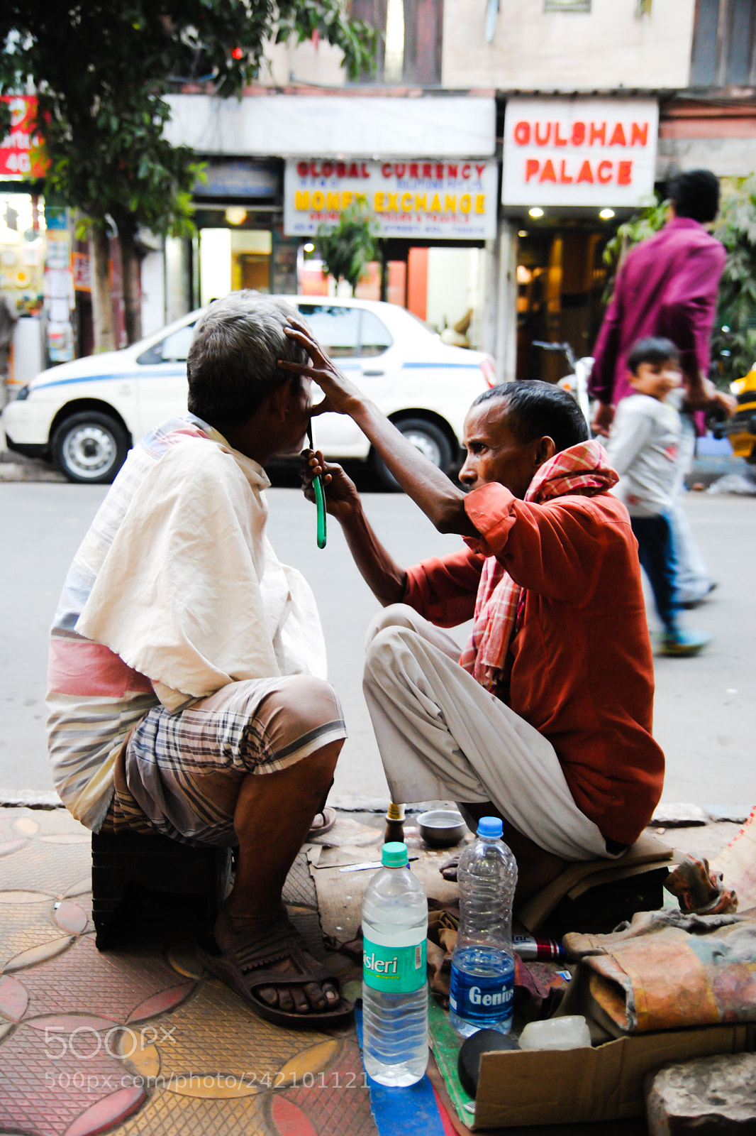 Nikon D3000 sample photo. Street shaving photography