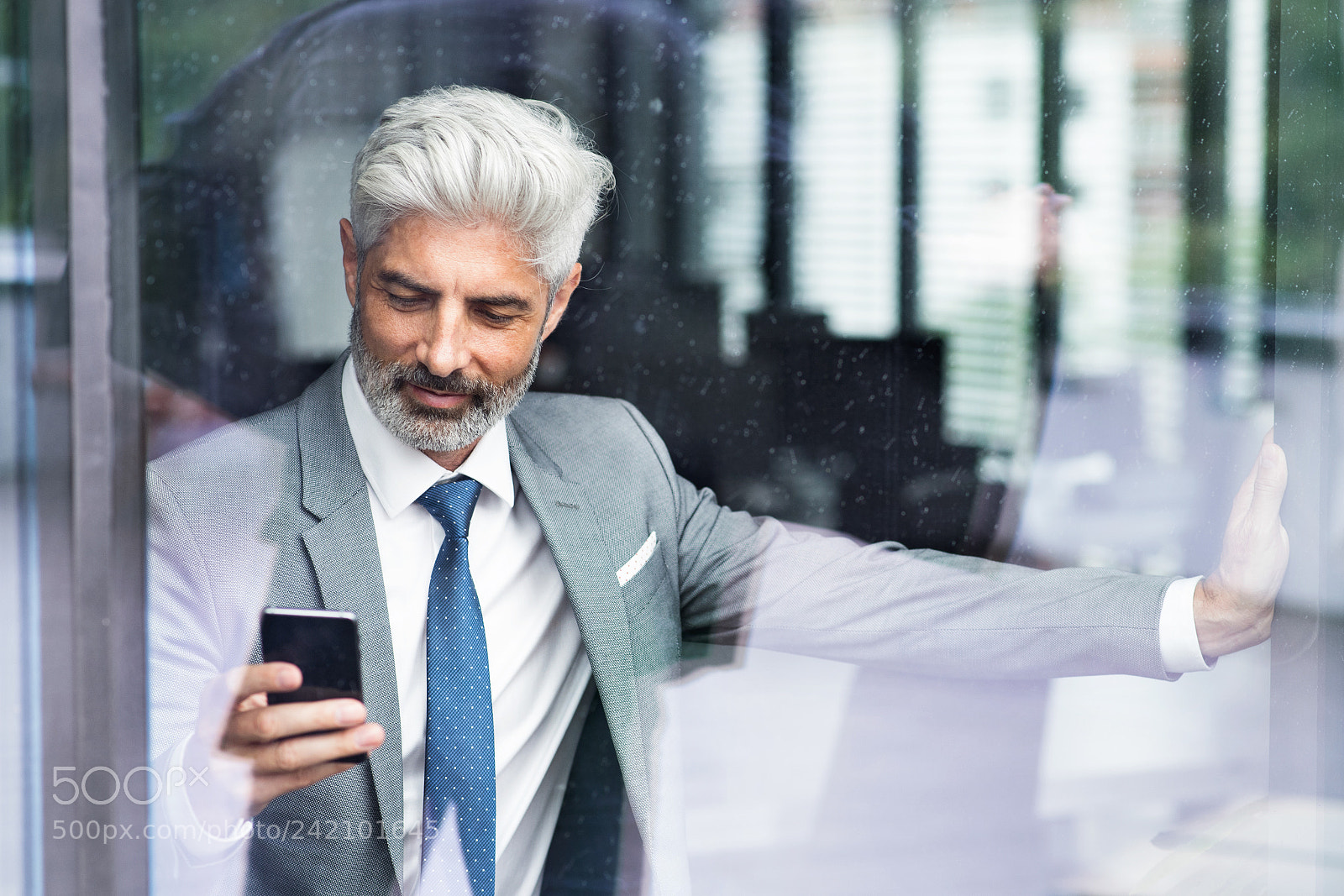 Nikon D5 sample photo. Mature businessman with smartphone photography
