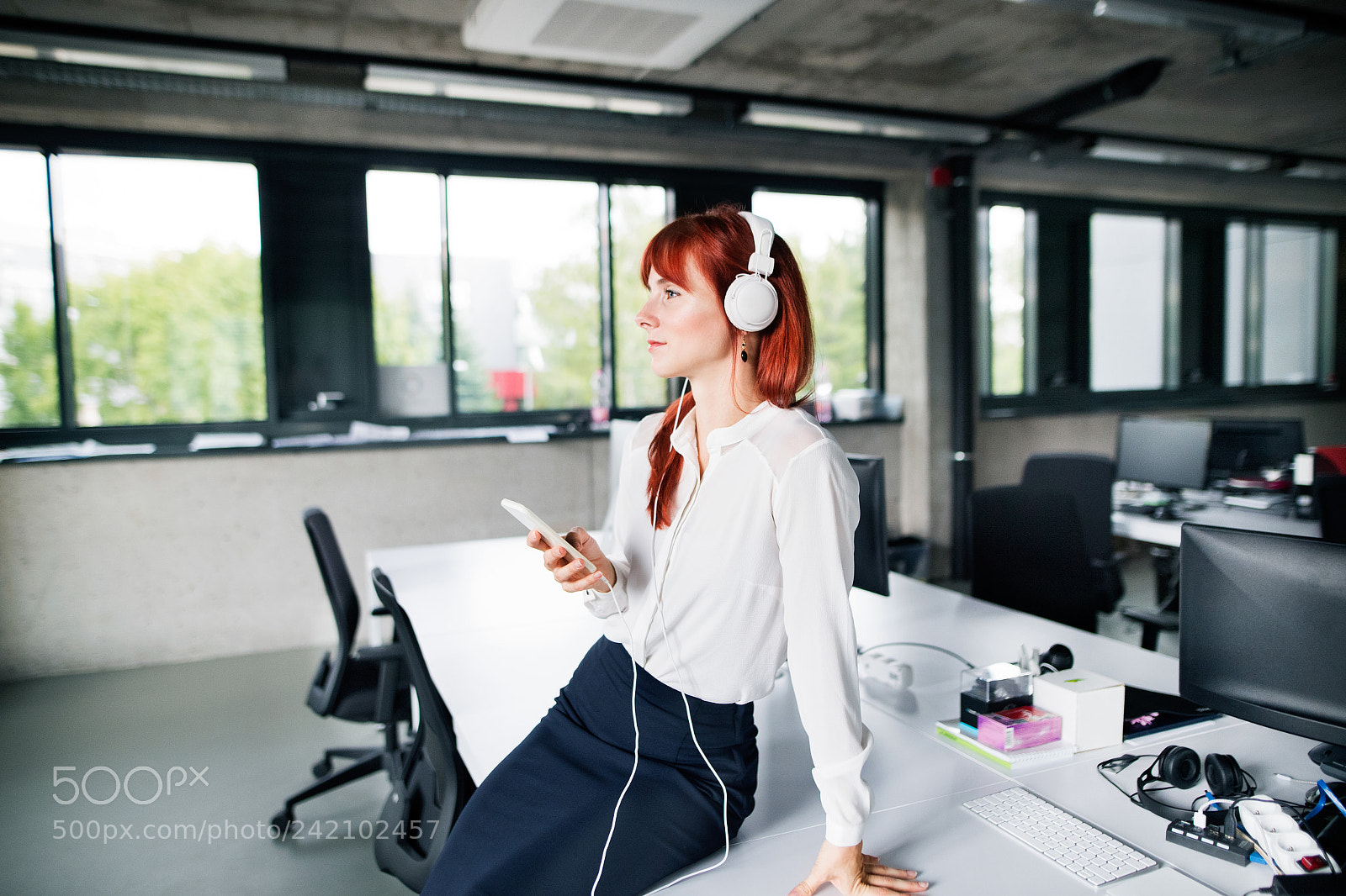 Nikon D5 sample photo. Businesswoman with earphones and photography