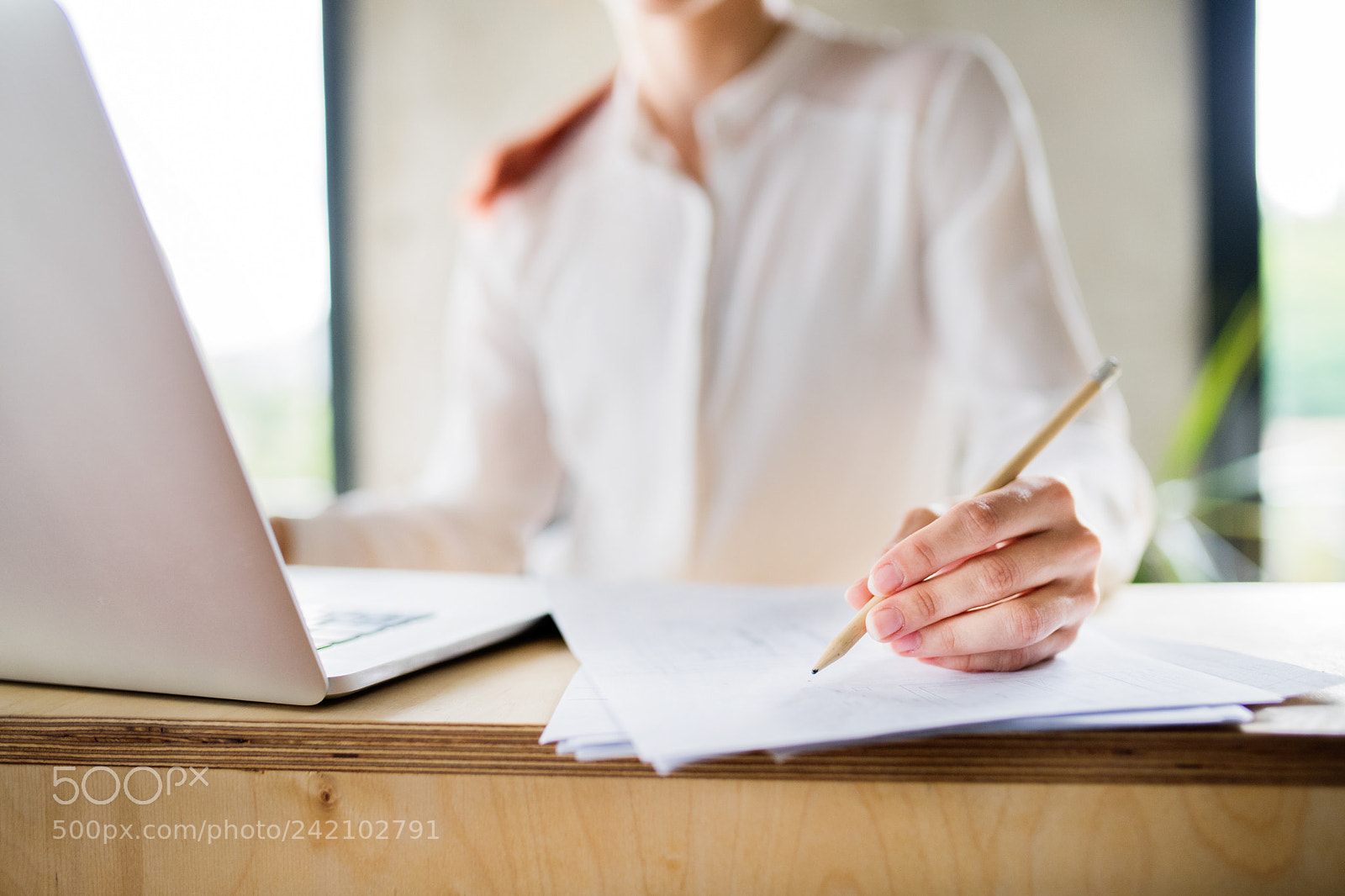 Nikon D5 sample photo. Unrecognizable businesswoman in the photography