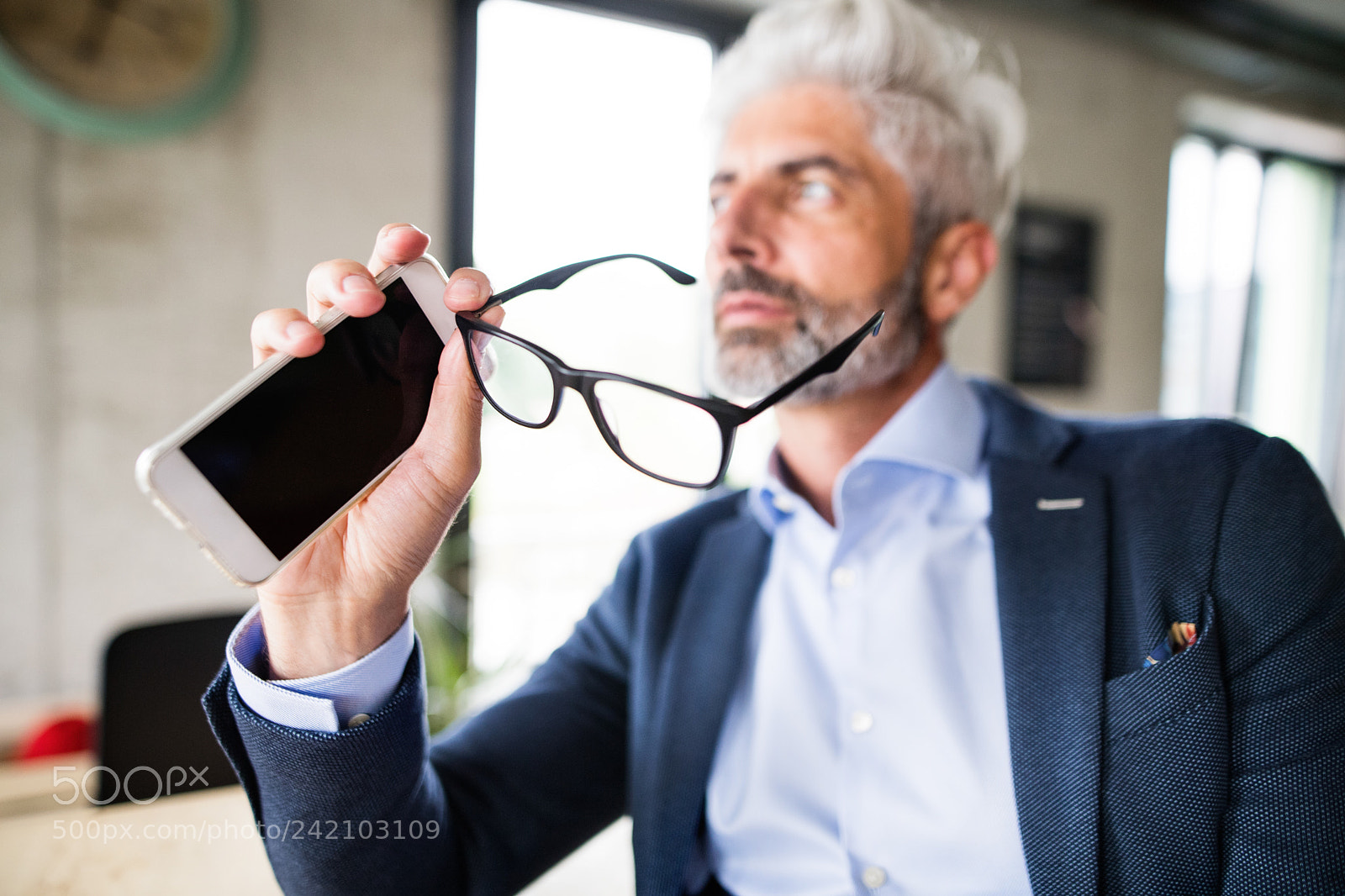 Nikon D5 sample photo. Mature businessman with smartphone photography