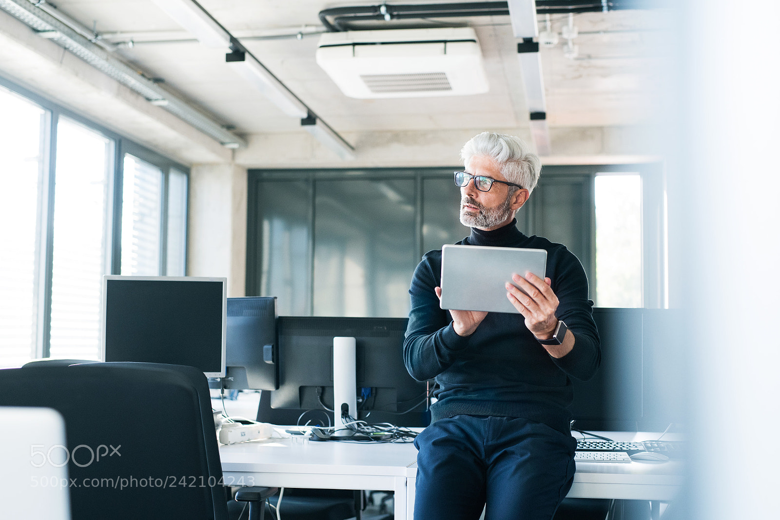 Nikon D5 sample photo. Mature businessman with tablet photography