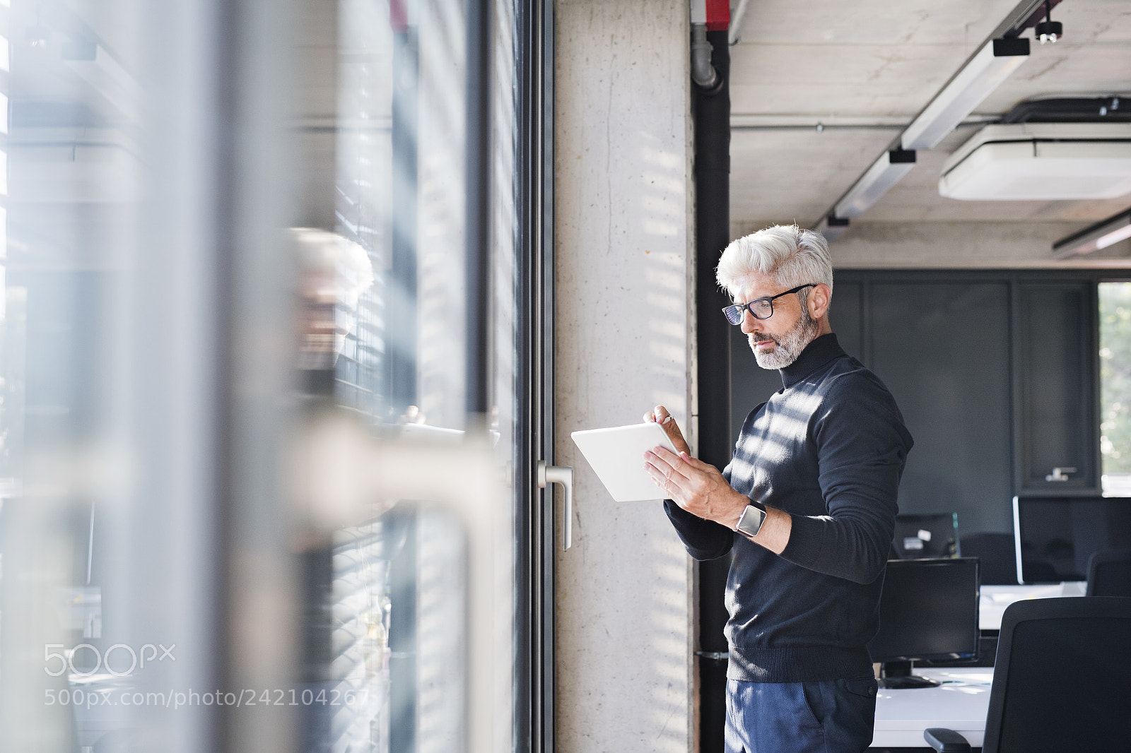 Nikon D5 sample photo. Mature businessman with tablet photography
