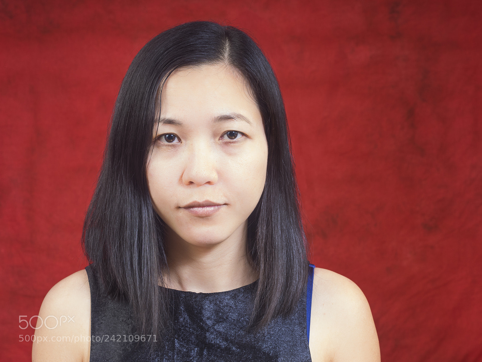 Olympus OM-D E-M1 sample photo. Asian girl on red photography