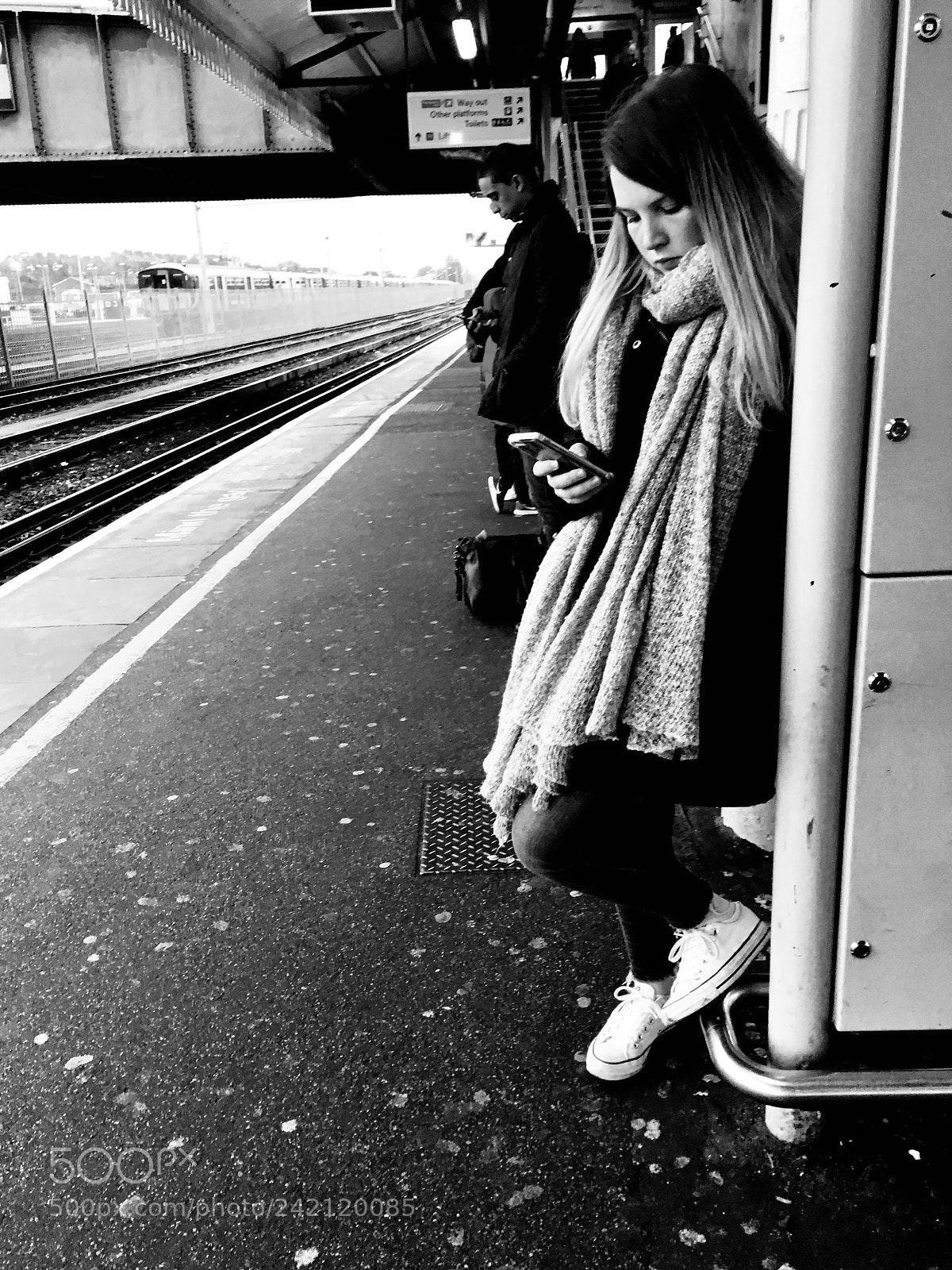 Apple iPhone SE sample photo. Engrossed in texting photography