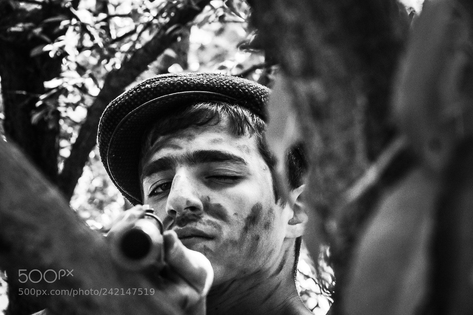 Canon EOS 7D Mark II sample photo. The boy with gun photography