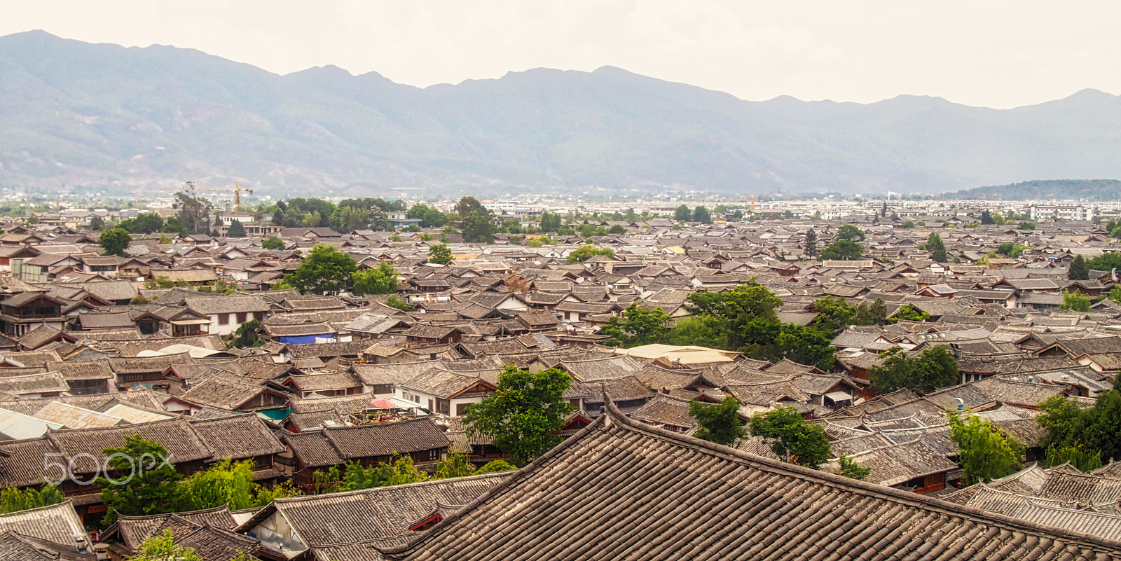 Olympus PEN E-PL2 sample photo. Lijiang roofs from above photography