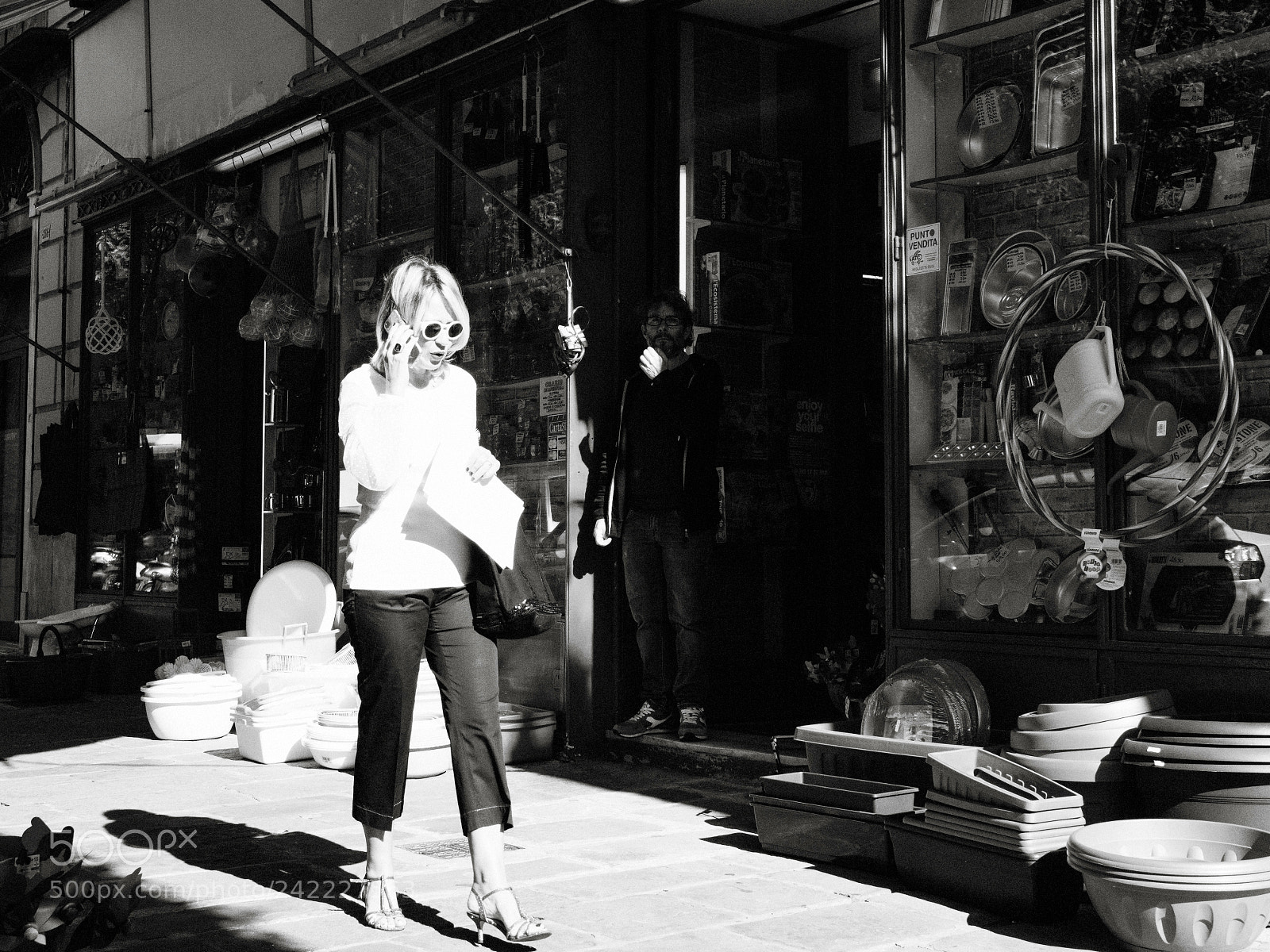 Sony a6500 sample photo. Woman walking into bright photography