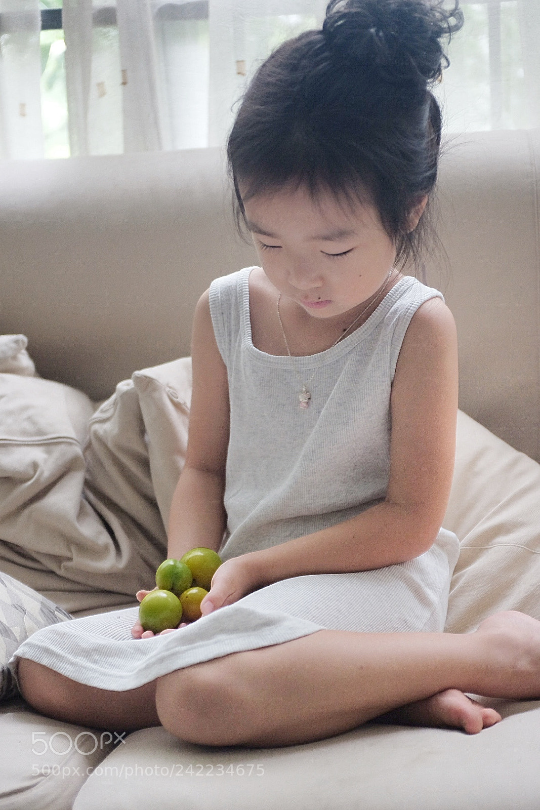 Fujifilm X100T sample photo. A green plum photography
