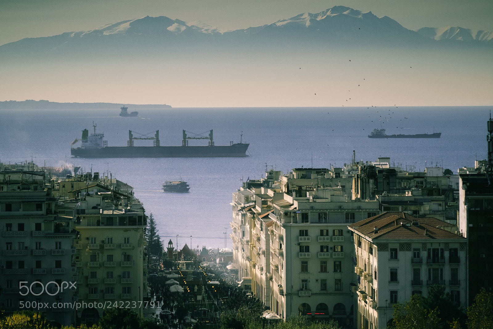 Fujifilm X-T20 sample photo. Mountain above ships, ships photography